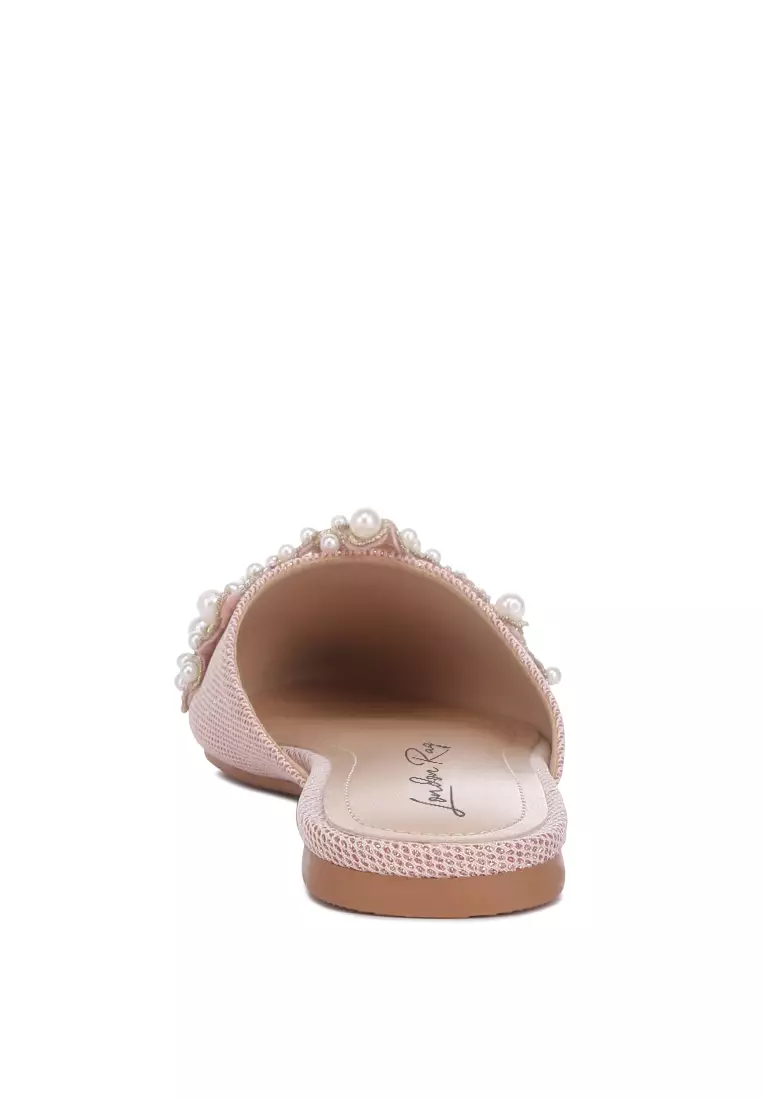 Bagal mutiara halus yang dihias dalam warna Blush