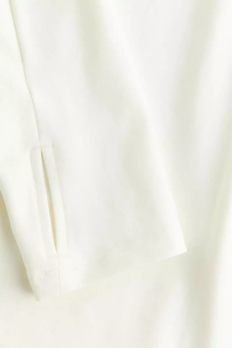 Slim Fit Long-sleeved sports top with SoftMove™
