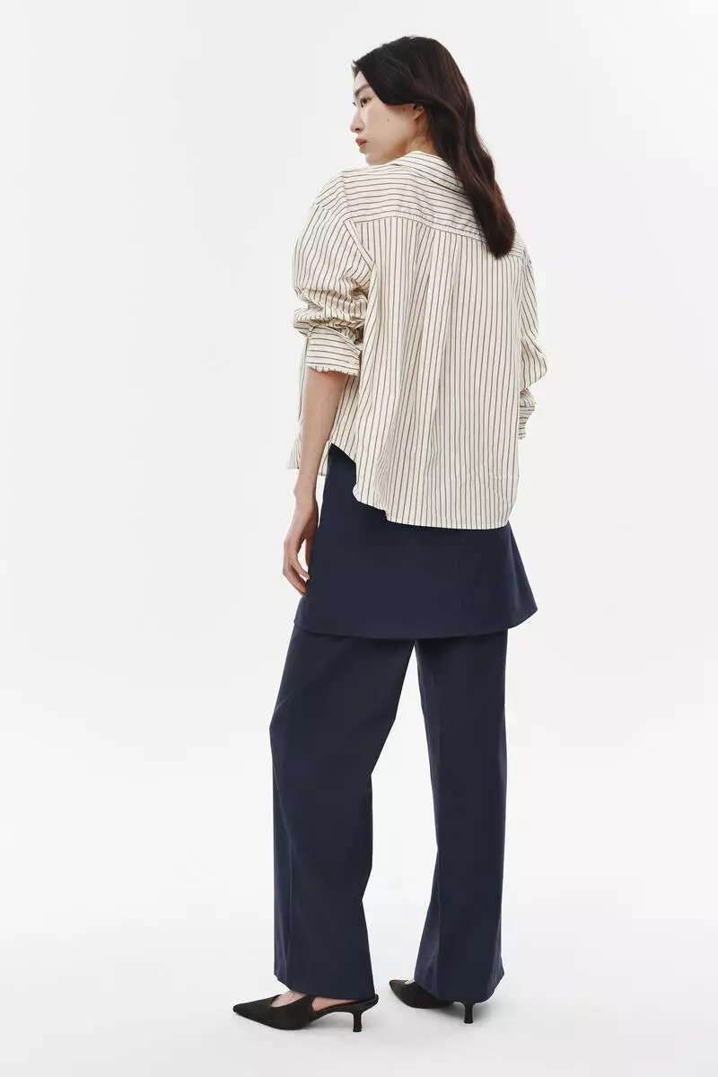 Skirt-layered trousers