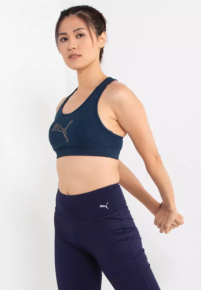 This Puma Women's Strong Mid-Impact Training Bra Elektro Purple is the most  popular style this season in For the love of Women sport shop.