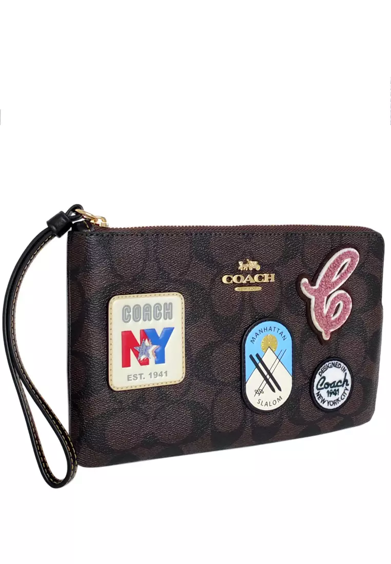 Buy Coach Coach Large Corner Zip Wristlet In Signature - Dark