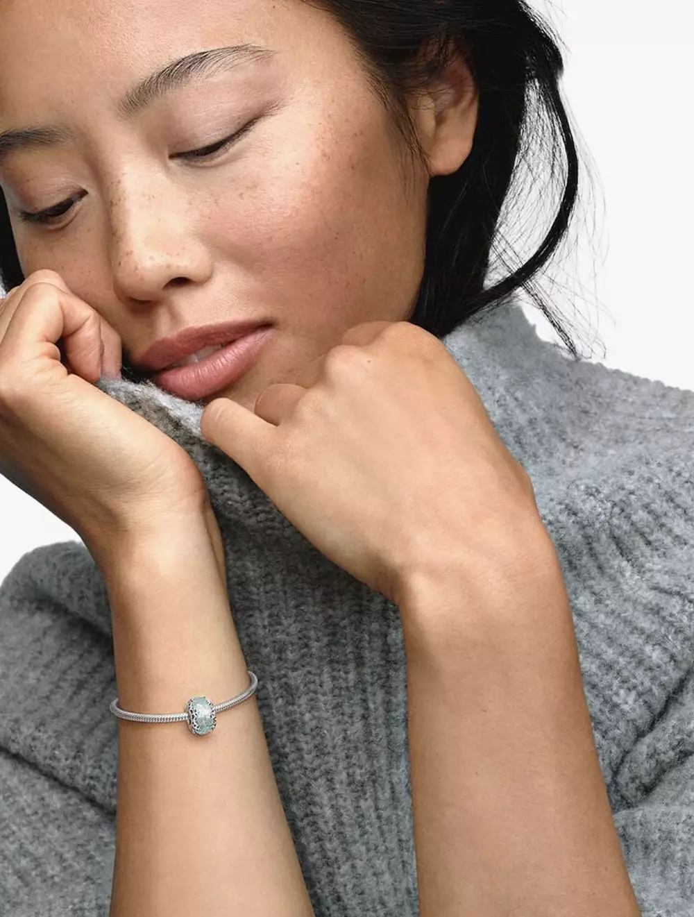 Snowflake sterling silver charm with blue frozen Murano glass