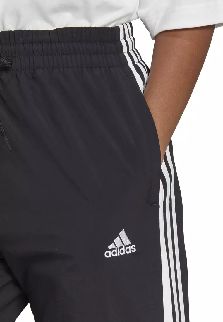 Buy ADIDAS essentials 3-stripes woven 7/8 tracksuit bottoms in