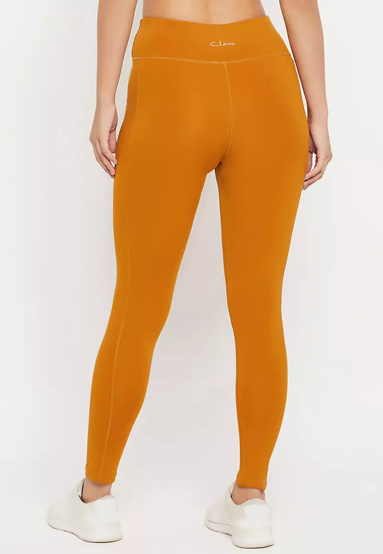 Buy Clovia High Rise Active Tights in Mustard Yellow with Side Pocket ...