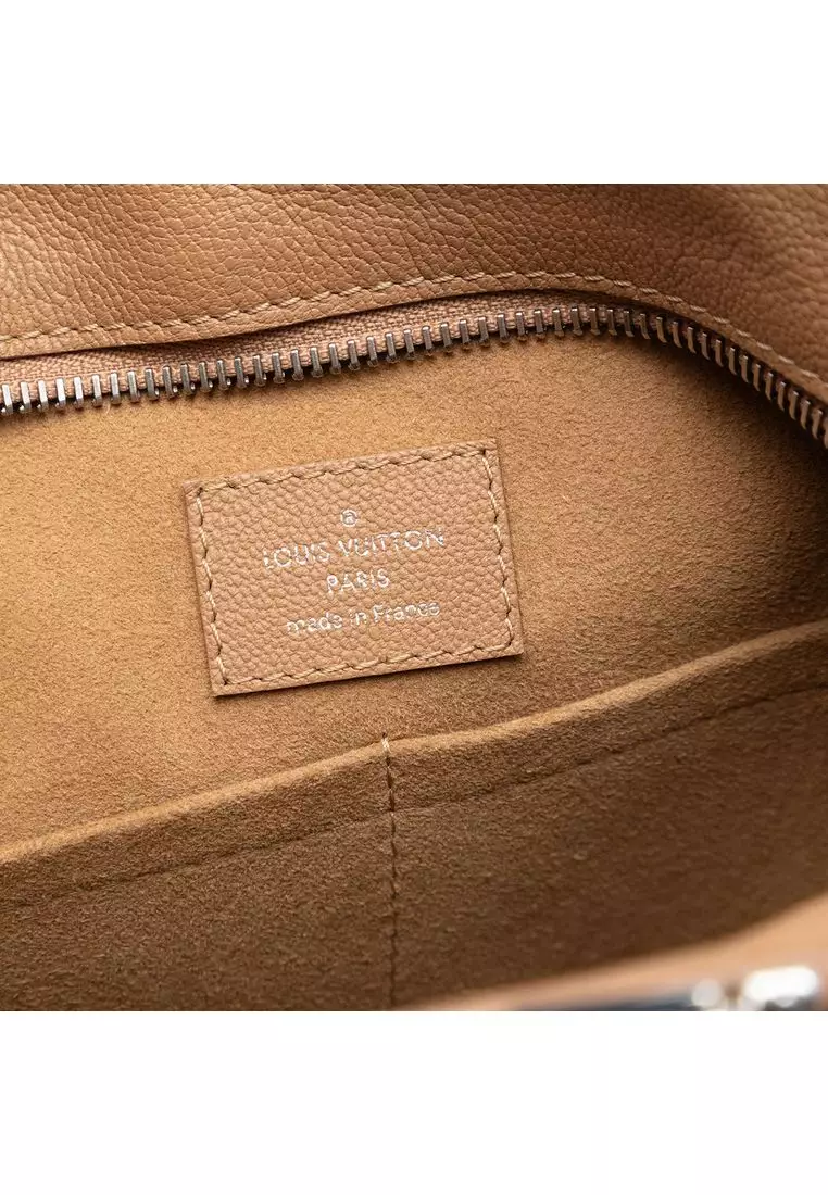 Pre-Loved Louis Vuitton Monogram Very Leather Very Zipped