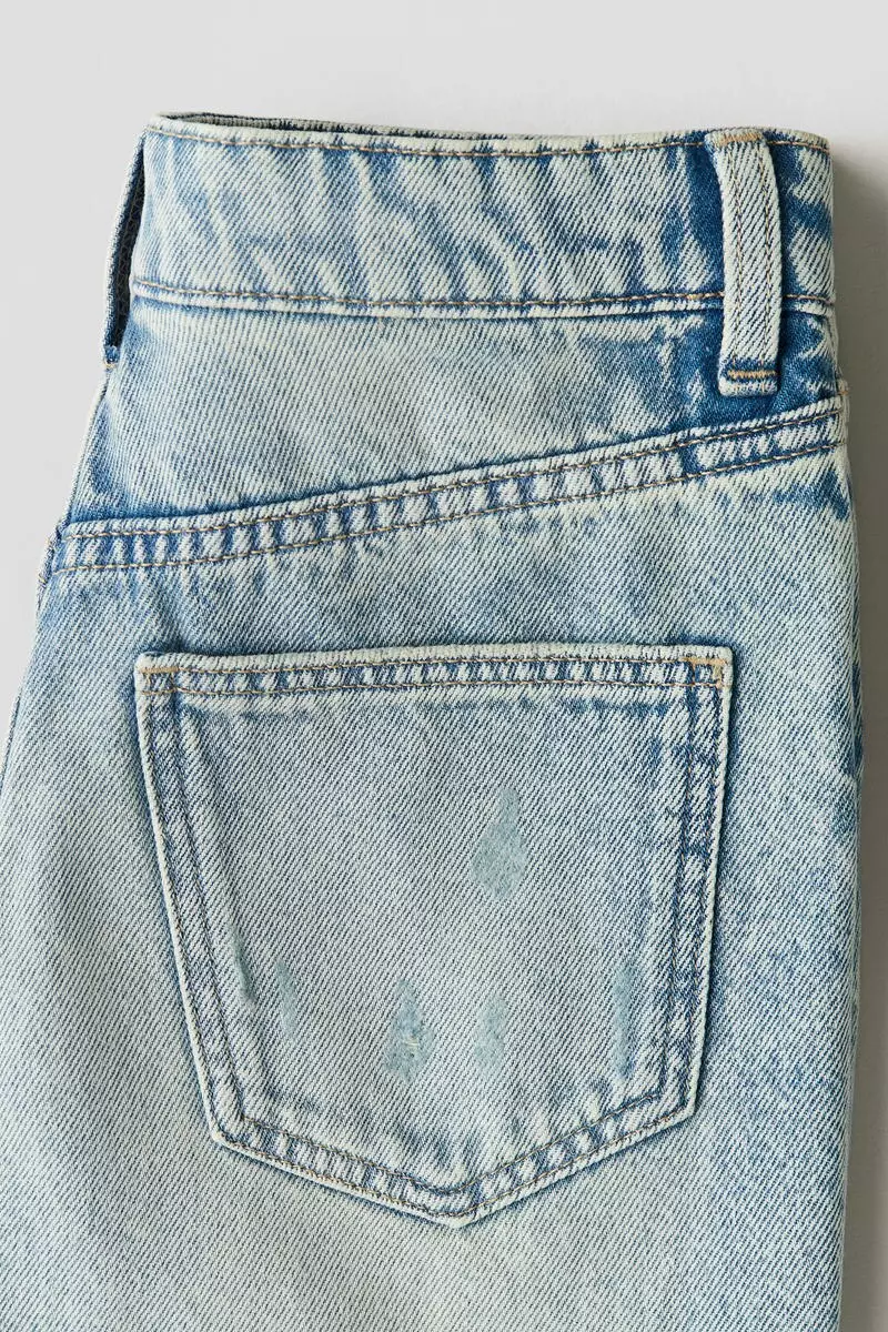 Raw-edge denim shorts