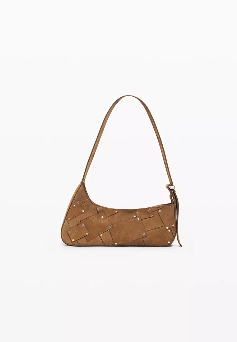 100% leather bag with small asymmetrical flap