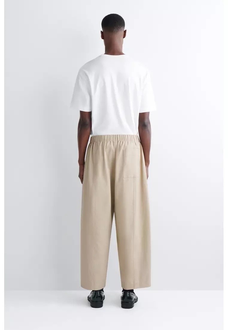 COS COTTON CROPPED RELAXED-FIT BARREL-LEG TROUSERS 2026 | Buy COS