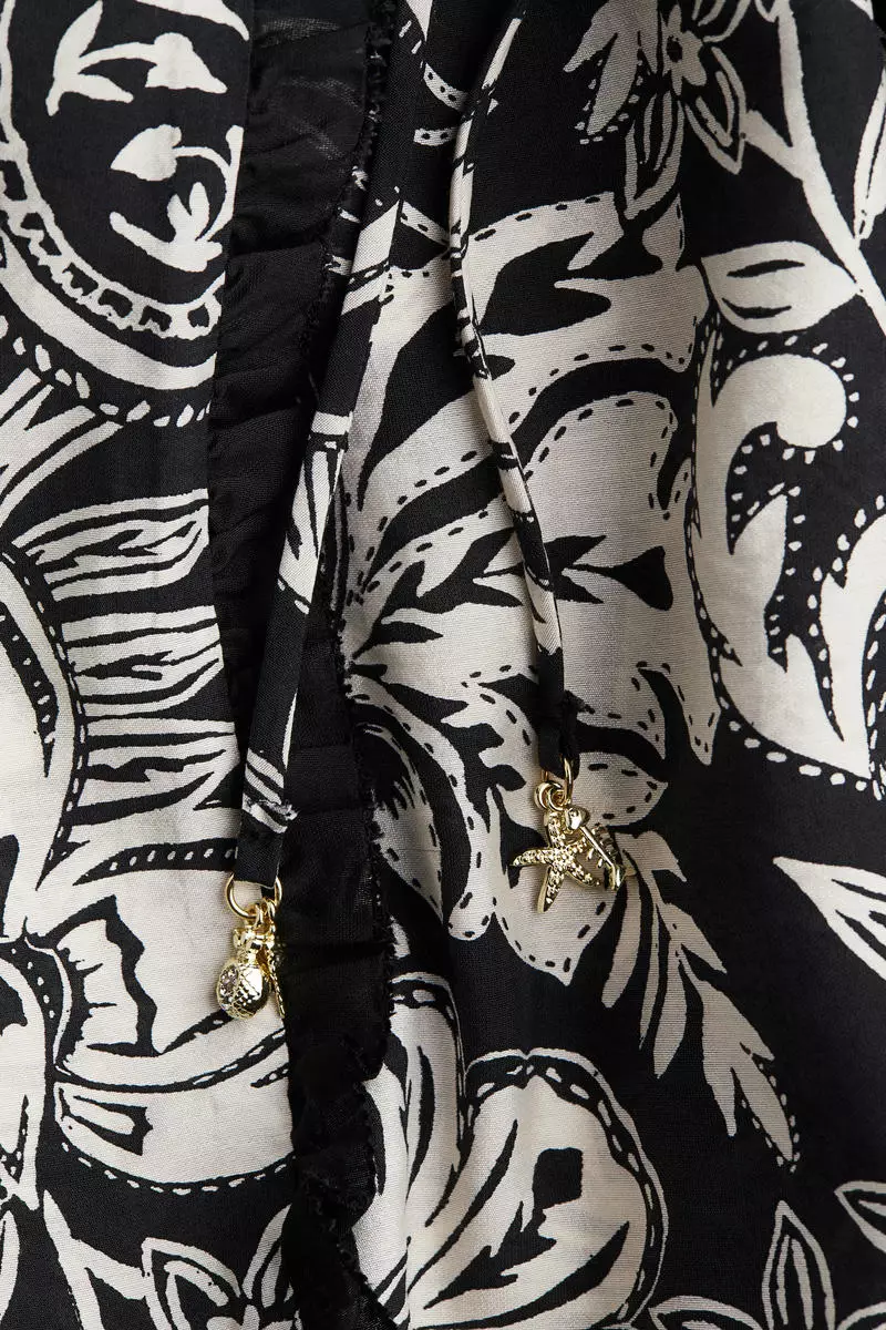 Trumpet-sleeved tunic dress