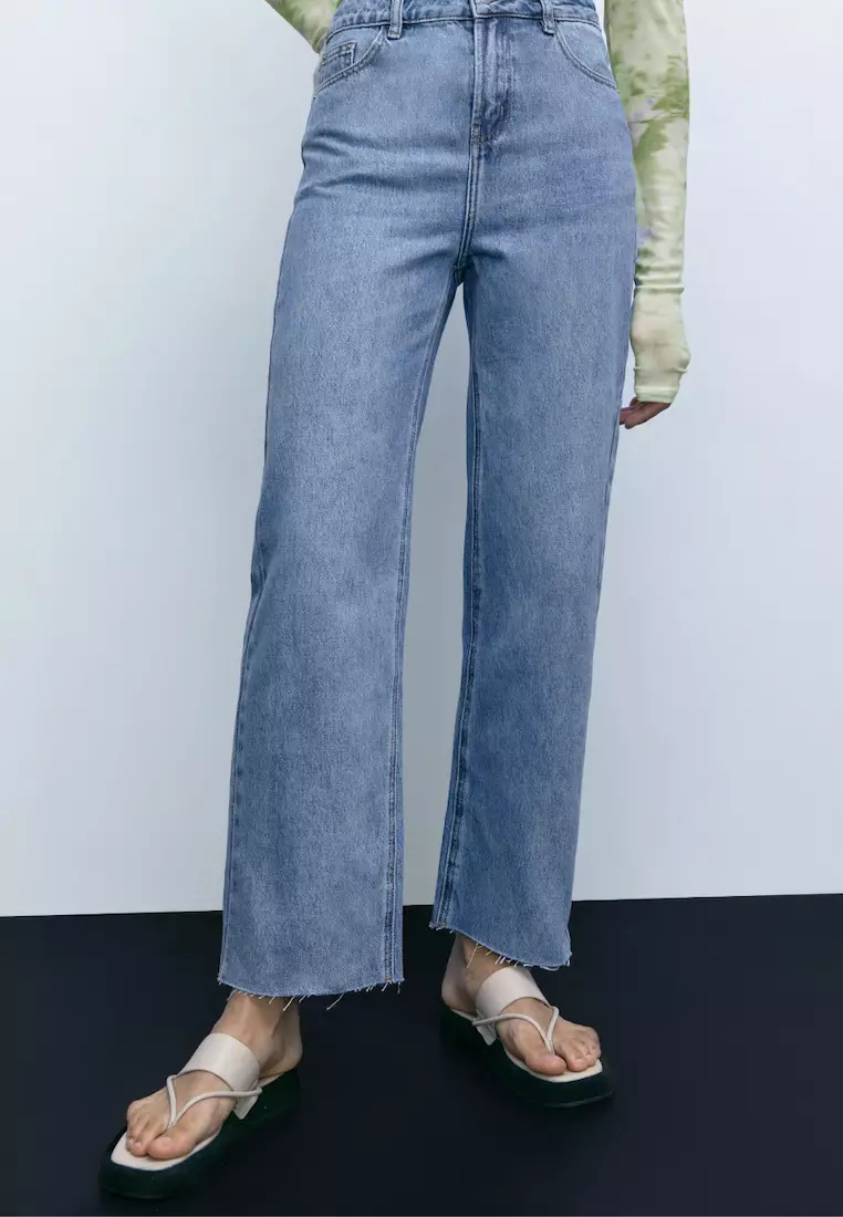 Ragged hem top jeans