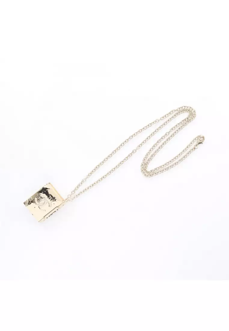 Pre-Loved Chanel coco mark book motif necklace GP gold black B22C