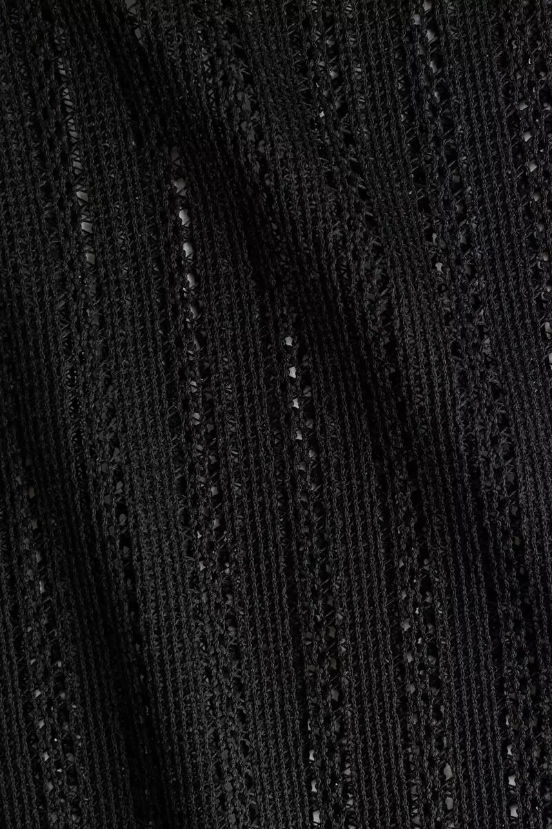 Wide hole-knit trousers