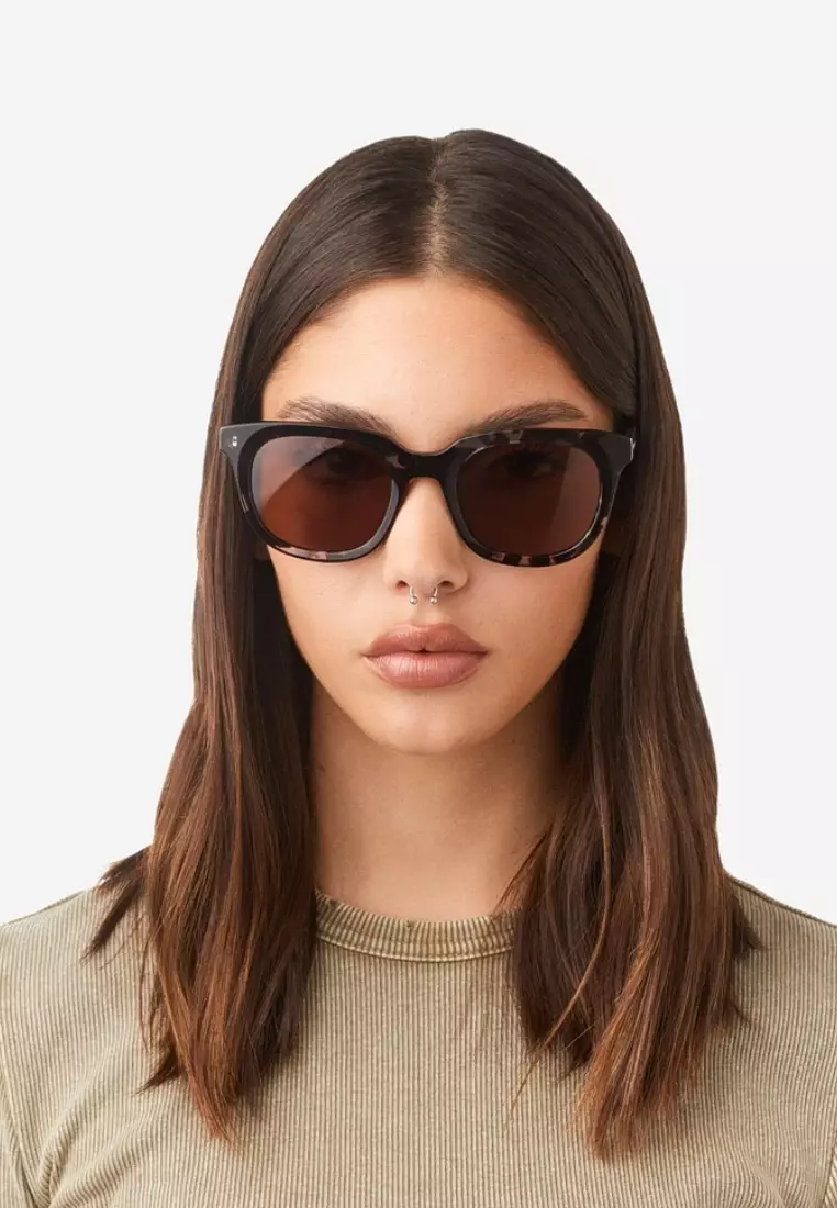 HAWKERS Blue Carey Brown Oasis Sunglasses For Men And Women, Unisex. Official Product Designed In Spain