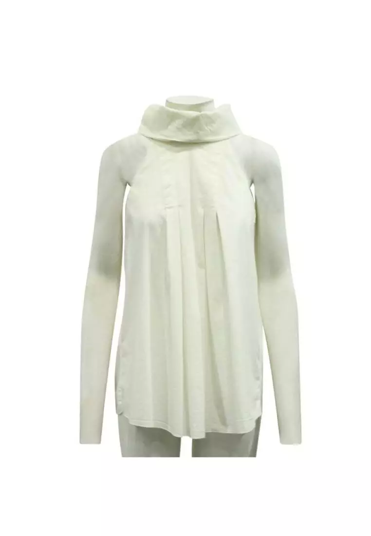 White sleeveless turtleneck store