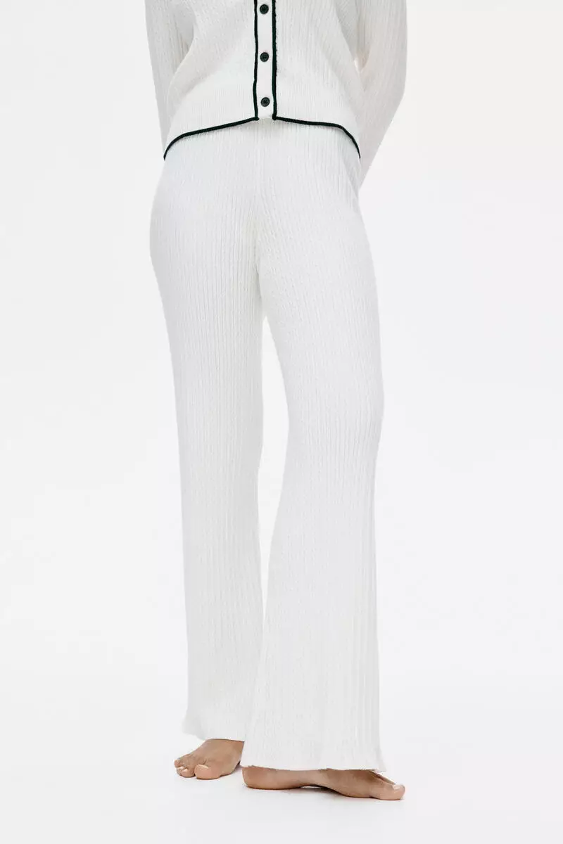 Flared cable-knit trousers