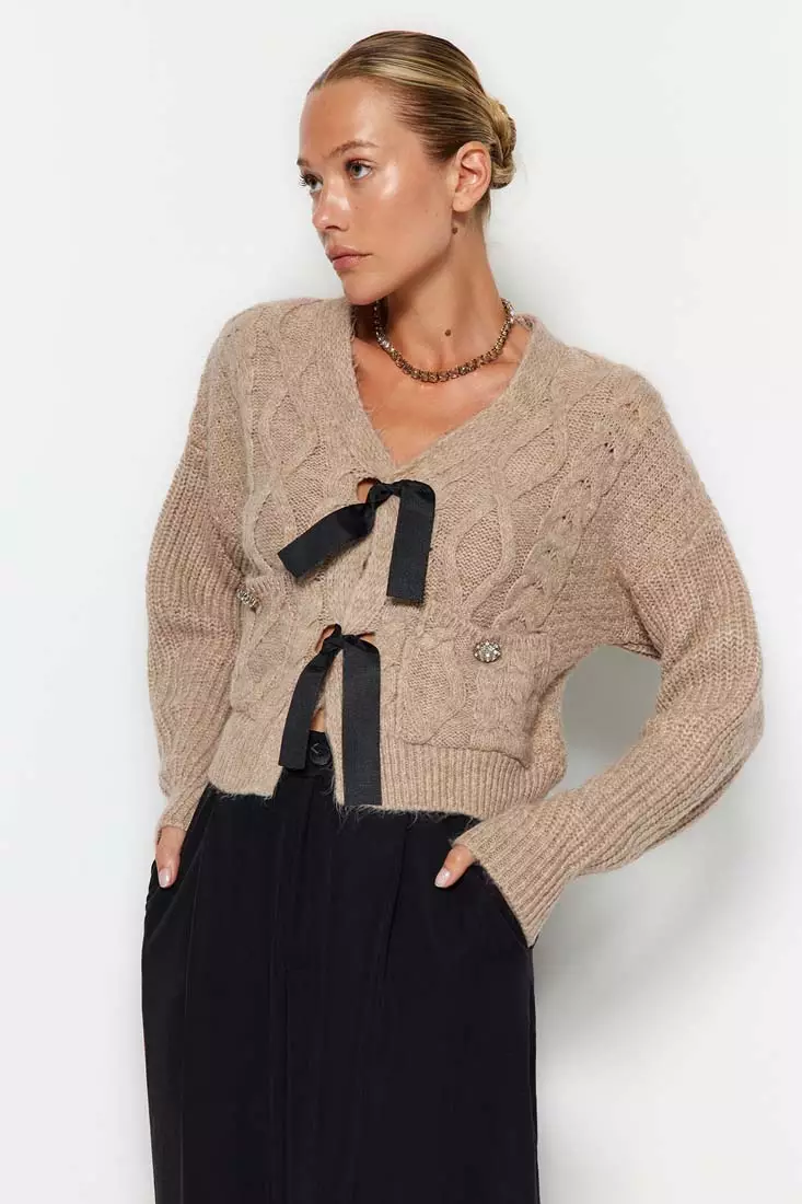 Sweater with ribbon on sale sleeves