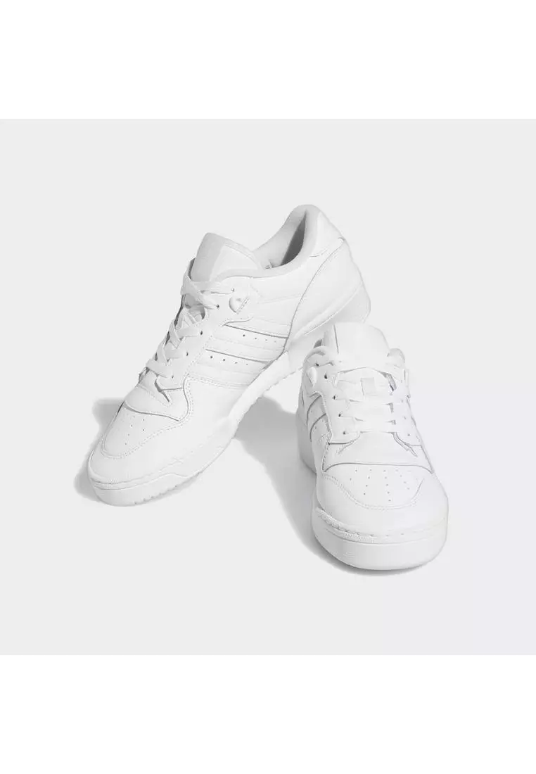 Adidas originals rivalry low hotsell trainers in triple white