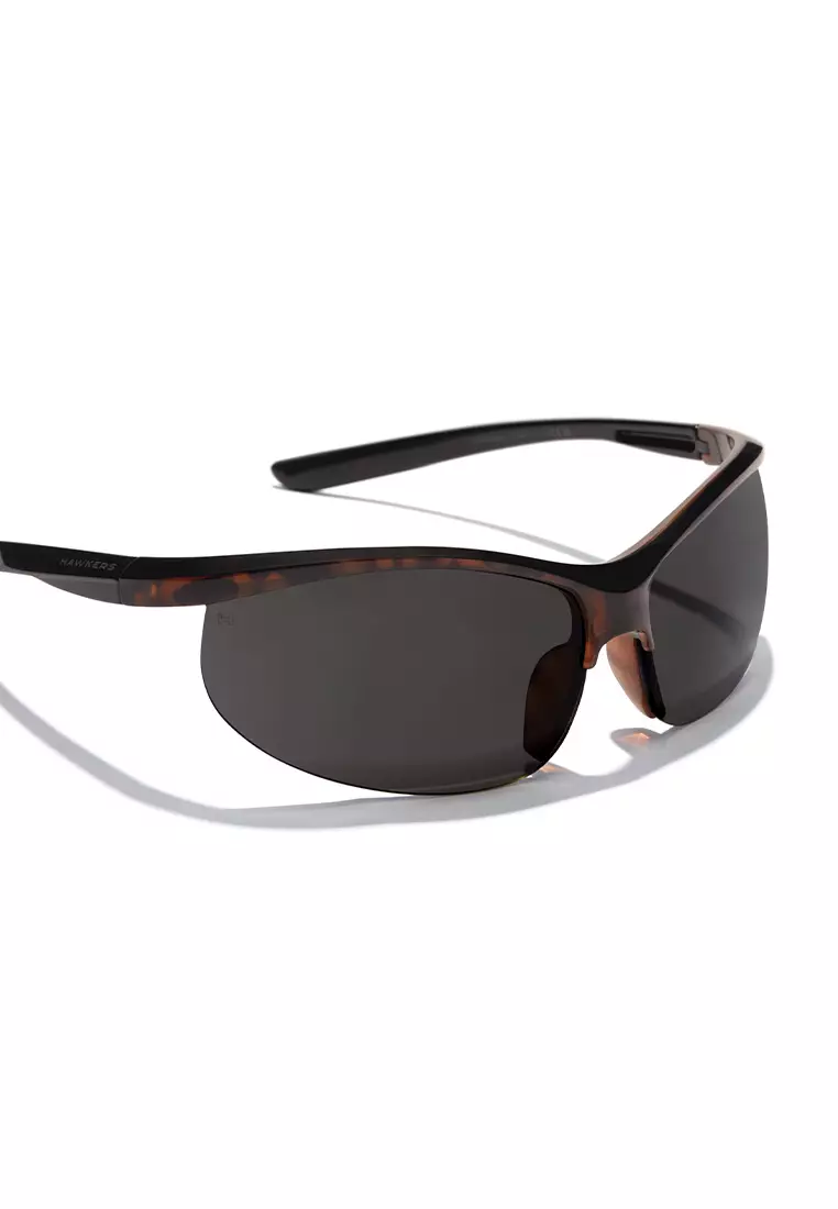 HAWKERS Vintage Carey Dark Grey Radiante Sunglasses For Men And Women, Unisex. Official Product Designed In Spain