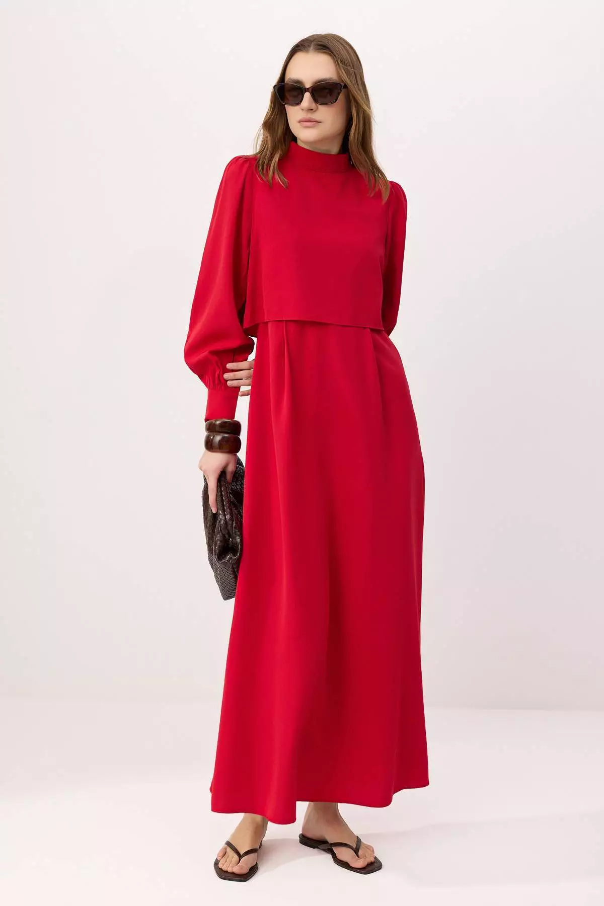 burgundy dress malaysia seyharamadzan in her dark maroon nikah kebaya  a bold, enchanting shade  that celebrates her confidence and grace. Crafted with a perfectly tailored  cut designed to flatter plus-size curves beautifully, the silhouette