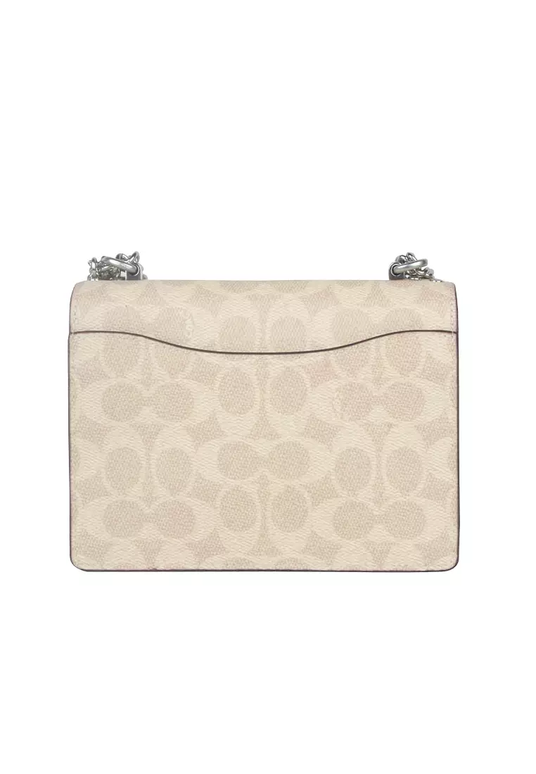 Mini Klare Crossbody Bag In Signature Canvas Sand Taupe CW206