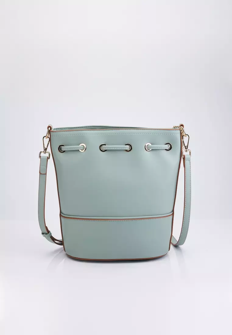 Bucket sling bag online hot sale