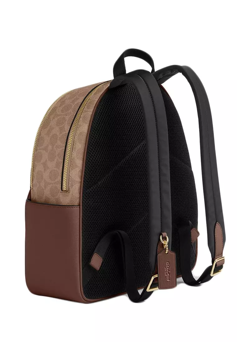 coach backpack sig charlie backpack Star Wars X Medium in Signature With Patches Signature coated canvas Inside zip cell phone and multifunction pockets Laptop compartment with zip closure Zip closure recycled polyester lining Top handle with 2 drop Outside zip pockets Adjustable shoulder straps Fits a 12” (zip compartment) or 13” (main compartment) laptop 10 3/4 (L) x 14 (H) x 5 1/4 (W) Style No. COACH Backpack Large Charlie Backpack