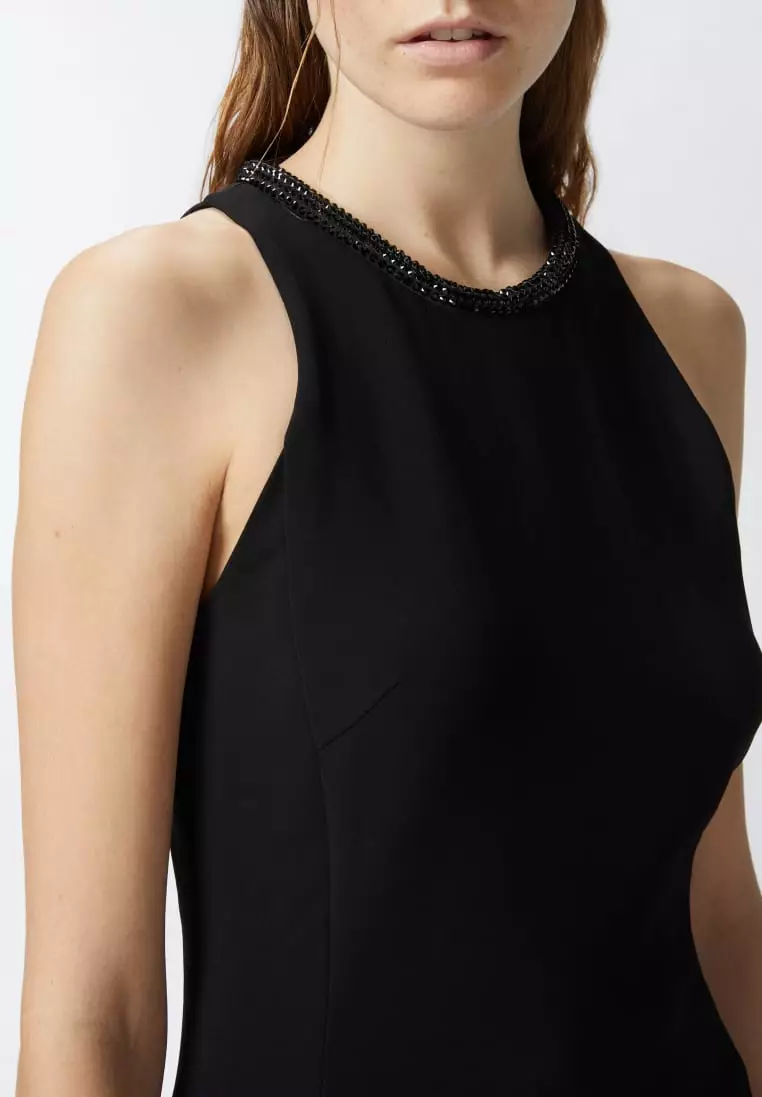 Black sheath dress with rhinestoned neckline