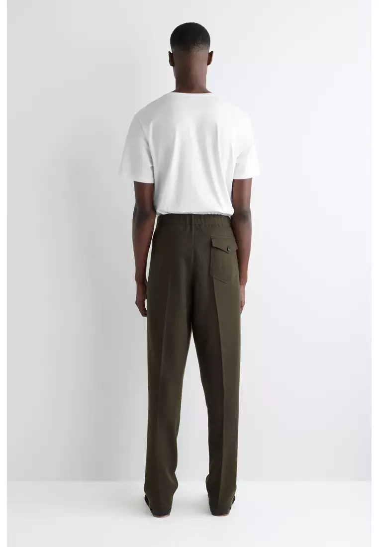 ELASTICATED BOILED-WOOL TROUSERS