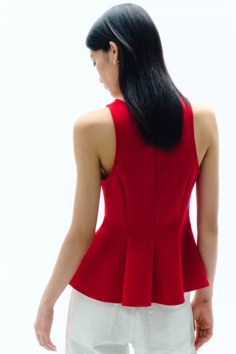 Sleeveless peplum top