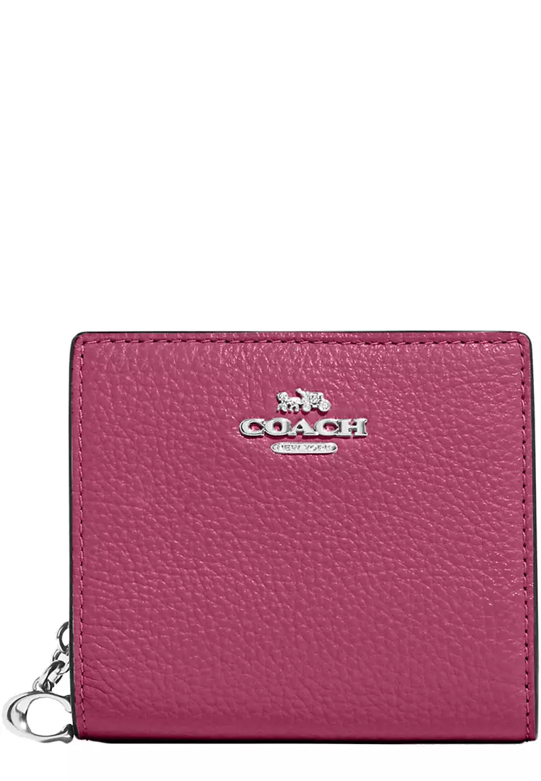 Pink and tan online coach wallet