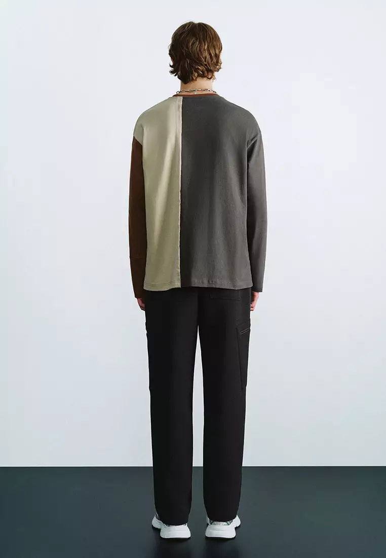 UR冬季新款男街头风解构设计感字母拼色长袖T恤UMV440158