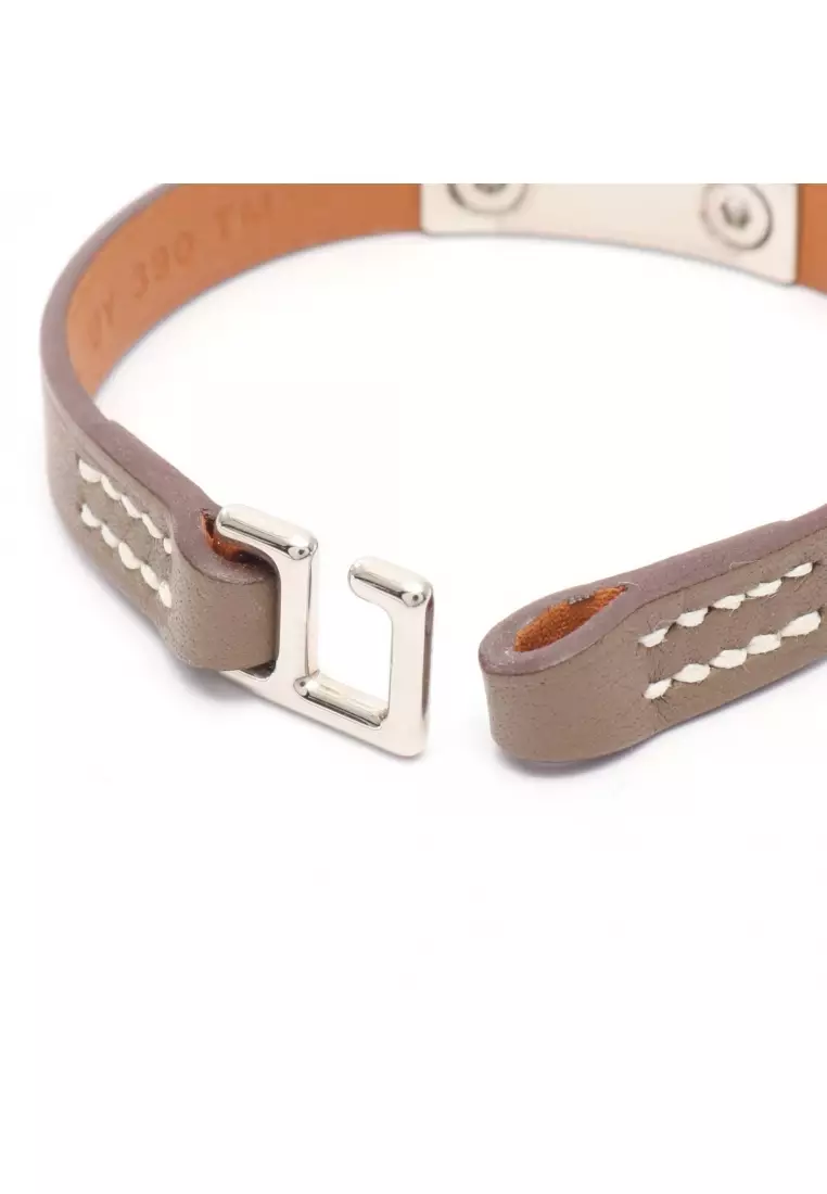 Pre-Loved Hermès Rival mini bracelet Veau Swift Gray brown U stamp