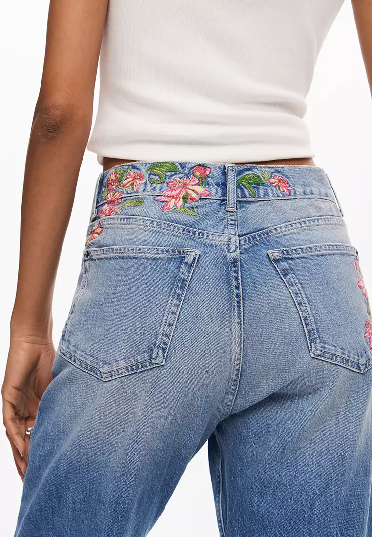 Desigual Woman Long denim pants with flowers.