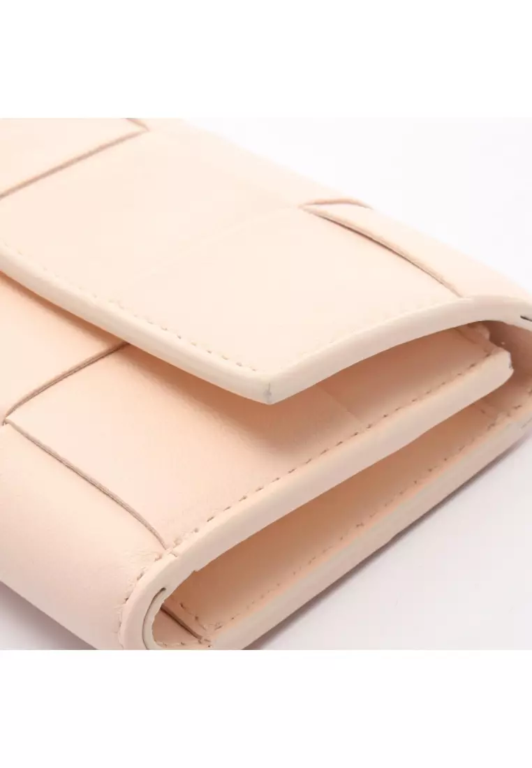 Pre-Loved BOTTEGA VENETA cassette maxi intrecciato Small trifold wallet leather Light pink