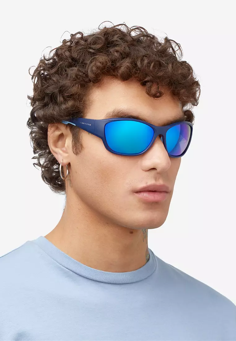 HAWKERS Navy Clear Blue RAVE Sunglasses for Men and Women, Unisex. UV400 Protection. Official Product designed in Spain