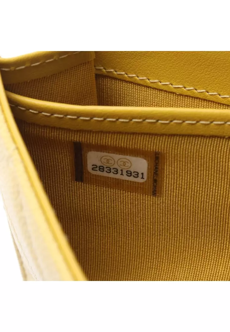 Pre-Loved Chanel CC filigree Bi-fold Long Wallet Caviar skin leather yellow gold hardware