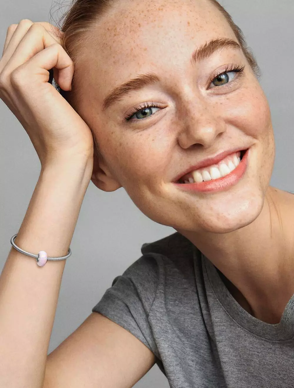 Sterling silver charm with pink lab-created opal