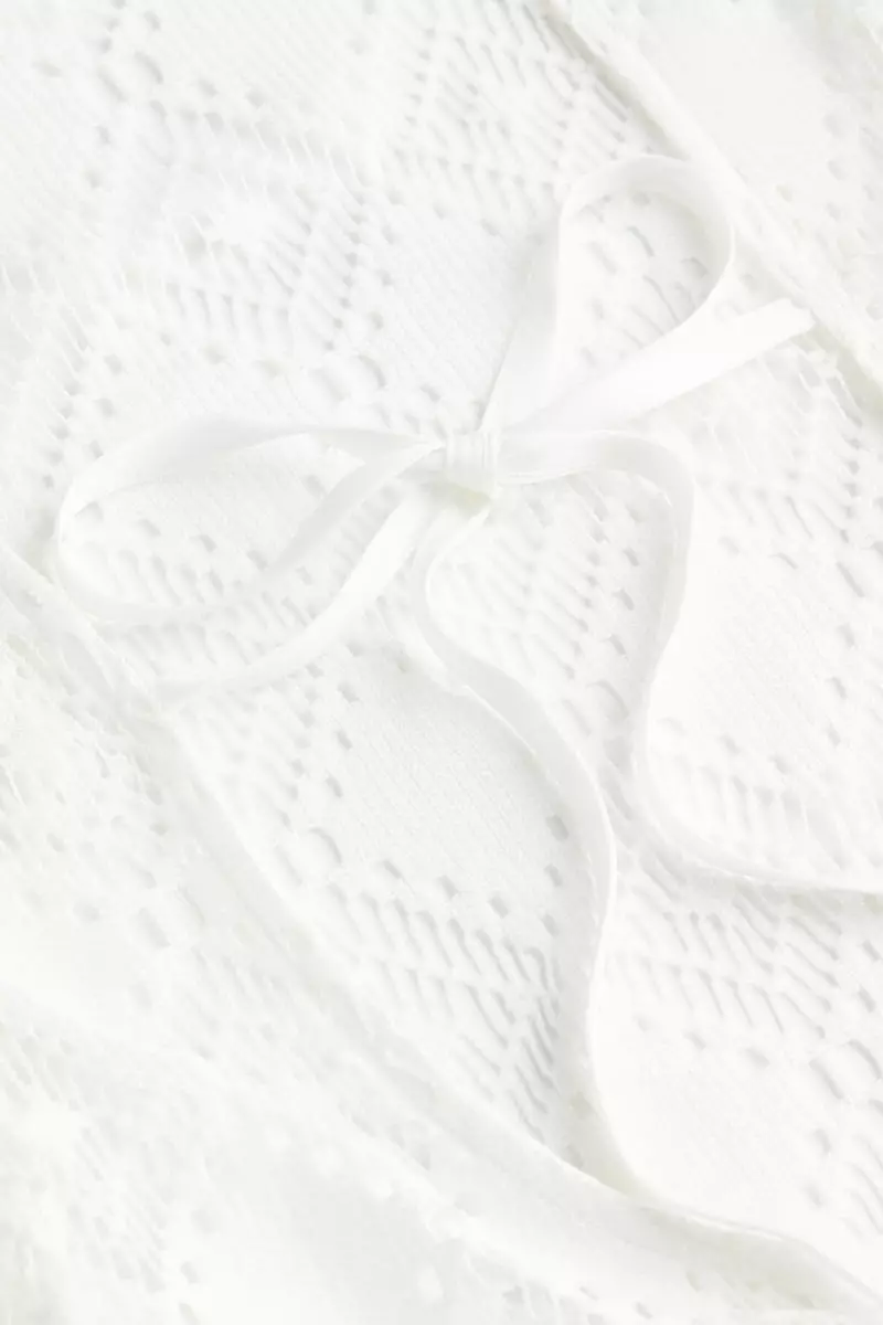 Open-backed crochet-look dress