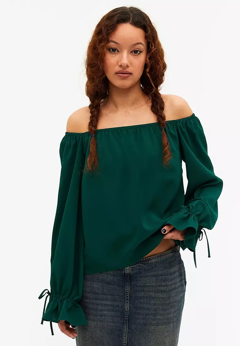 Solid off shoulder long sleeve slit cuff blouse on sale