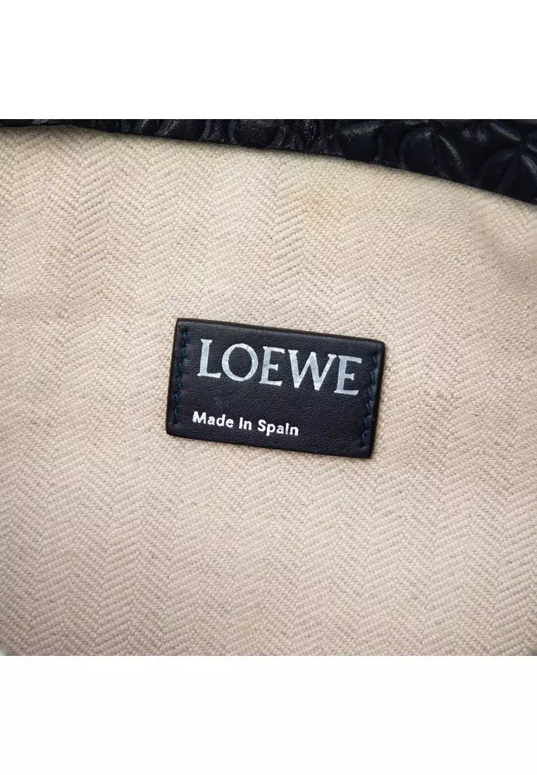 Pre-Loved Loewe Embossed Anagram Leather Repeat T Clutch