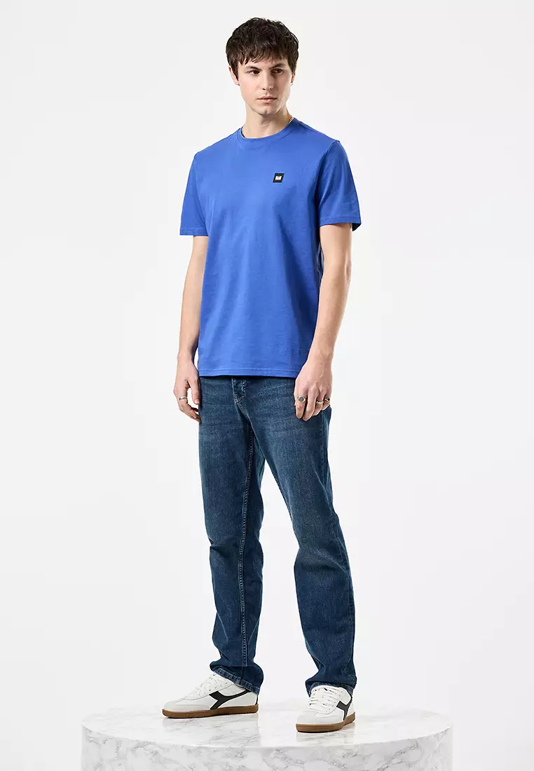 MENS BLUEBELL CANNON BEACH BADGE TEE