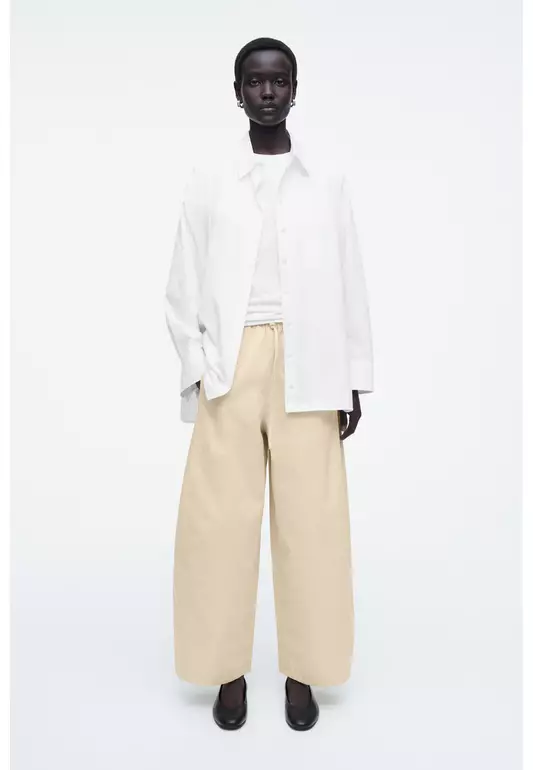 ELASTICATED BARREL-LEG TROUSERS