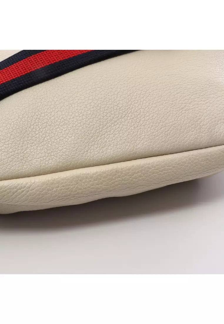 Gucci print leather shop belt bag price