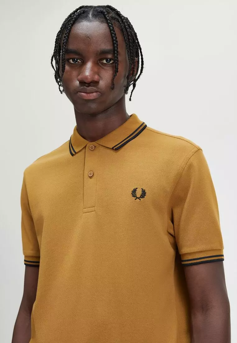 fred perry bold cuff short sleeve polo shirt