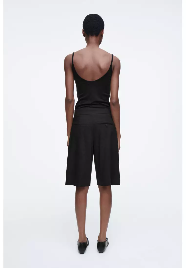 LONGLINE PLEATED LINEN SHORTS