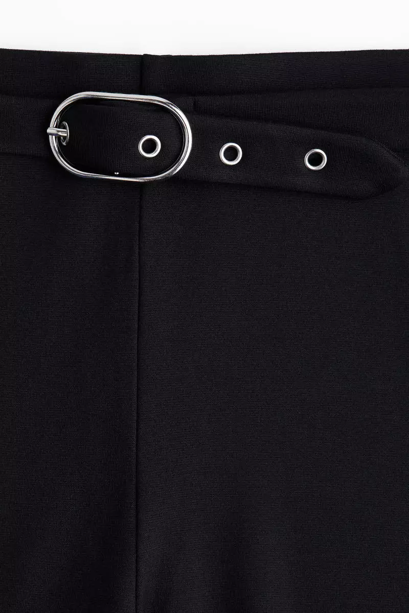 Flared belt-detail trousers